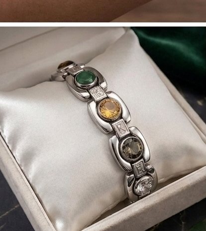 The Kubeera Crystal Band presented in a gift box on a satin pillow